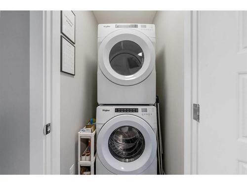 256 Willow Corner, Cochrane, AB - Indoor Photo Showing Laundry Room