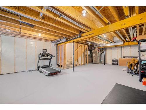 256 Willow Corner, Cochrane, AB - Indoor Photo Showing Basement