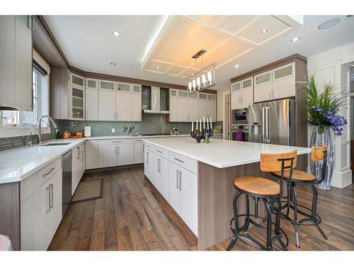 201 Kinniburgh Cove, Chestermere, AB - Indoor Photo Showing Kitchen With Upgraded Kitchen