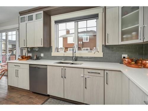 201 Kinniburgh Cove, Chestermere, AB - Indoor Photo Showing Kitchen With Double Sink