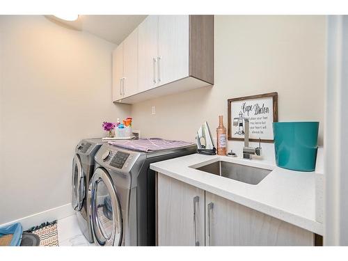 201 Kinniburgh Cove, Chestermere, AB - Indoor Photo Showing Laundry Room