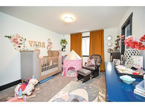 201 Kinniburgh Cove, Chestermere, AB - Indoor Photo Showing Bedroom