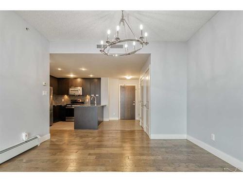 1107-99 Spruce Place Sw, Calgary, AB - Indoor Photo Showing Kitchen