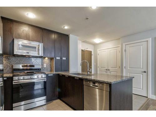 1107-99 Spruce Place Sw, Calgary, AB - Indoor Photo Showing Kitchen With Stainless Steel Kitchen With Upgraded Kitchen