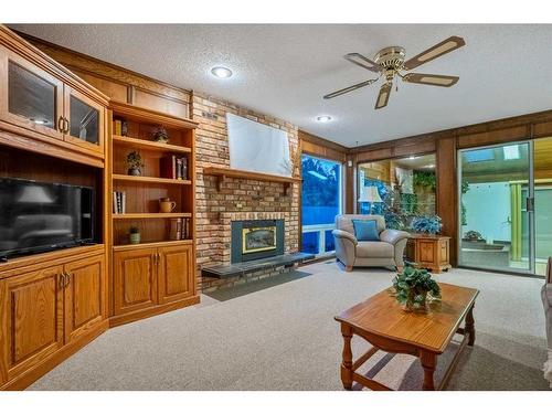 14108 Park Estates Drive Se, Calgary, AB - Indoor Photo Showing Living Room With Fireplace