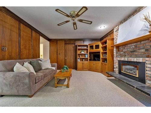 14108 Park Estates Drive Se, Calgary, AB - Indoor Photo Showing Living Room With Fireplace