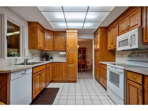 14108 Park Estates Drive Se, Calgary, AB - Indoor Photo Showing Kitchen With Double Sink