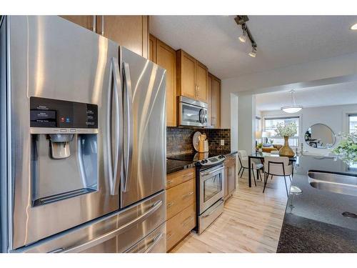 10 Aspen Hills Terrace Sw, Calgary, AB - Indoor Photo Showing Kitchen With Stainless Steel Kitchen