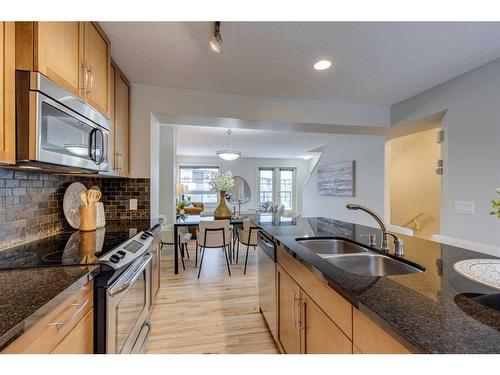 10 Aspen Hills Terrace Sw, Calgary, AB - Indoor Photo Showing Kitchen With Double Sink