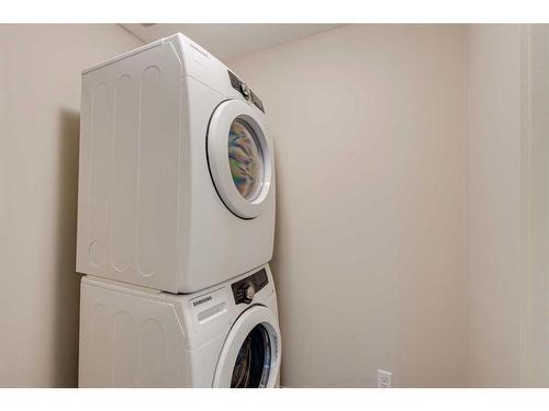 10 Aspen Hills Terrace Sw, Calgary, AB - Indoor Photo Showing Laundry Room