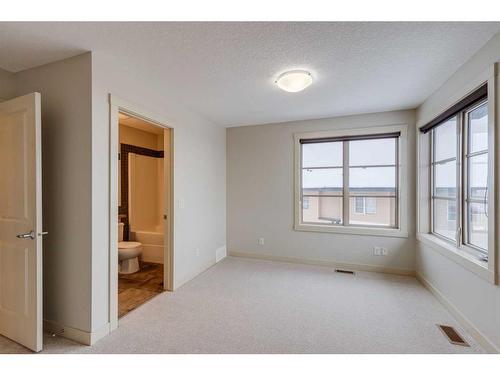 10 Aspen Hills Terrace Sw, Calgary, AB - Indoor Photo Showing Other Room