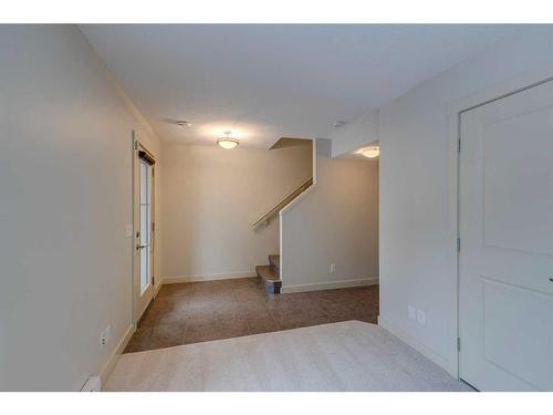 10 Aspen Hills Terrace Sw, Calgary, AB - Indoor Photo Showing Other Room