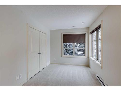 10 Aspen Hills Terrace Sw, Calgary, AB - Indoor Photo Showing Other Room