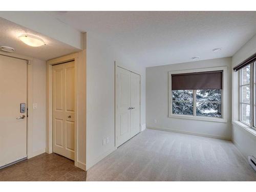 10 Aspen Hills Terrace Sw, Calgary, AB - Indoor Photo Showing Other Room