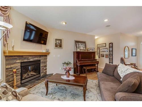 6007 60 Street, Olds, AB - Indoor Photo Showing Living Room With Fireplace