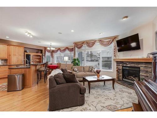 6007 60 Street, Olds, AB - Indoor Photo Showing Living Room With Fireplace