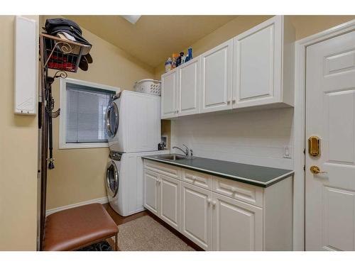 48 Prominence Point Sw, Calgary, AB - Indoor Photo Showing Laundry Room