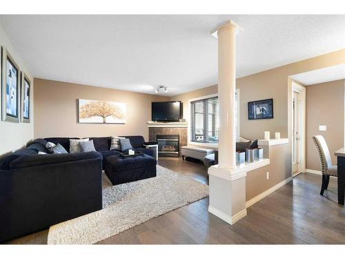 198 Royal Birkdale Crescent Nw, Calgary, AB - Indoor Photo Showing Living Room With Fireplace