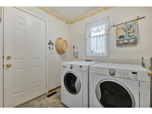 266 Rocky Ridge Bay Nw, Calgary, AB - Indoor Photo Showing Laundry Room