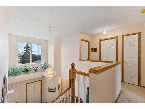 266 Rocky Ridge Bay Nw, Calgary, AB - Indoor Photo Showing Other Room