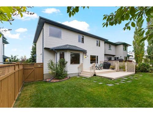 266 Rocky Ridge Bay Nw, Calgary, AB - Outdoor With Deck Patio Veranda