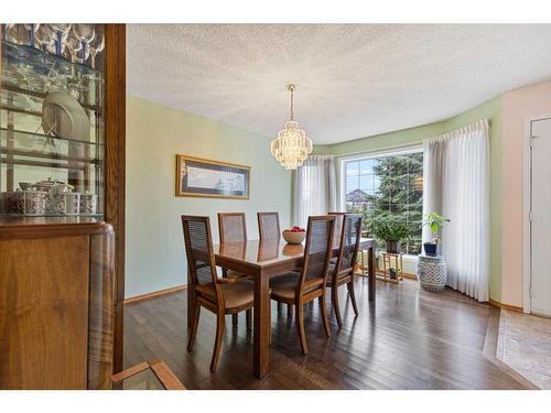 266 Rocky Ridge Bay Nw, Calgary, AB - Indoor Photo Showing Dining Room