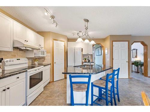 266 Rocky Ridge Bay Nw, Calgary, AB - Indoor Photo Showing Kitchen