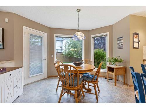 266 Rocky Ridge Bay Nw, Calgary, AB - Indoor Photo Showing Dining Room