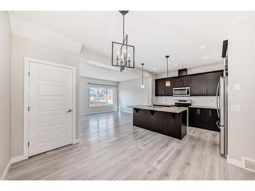 298 Kingfisher Crescent Se, Airdrie, AB - Indoor Photo Showing Kitchen