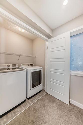 298 Kingfisher Crescent Se, Airdrie, AB - Indoor Photo Showing Laundry Room