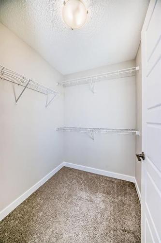 298 Kingfisher Crescent Se, Airdrie, AB - Indoor With Storage