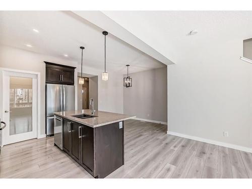 298 Kingfisher Crescent Se, Airdrie, AB - Indoor Photo Showing Kitchen With Stainless Steel Kitchen With Upgraded Kitchen