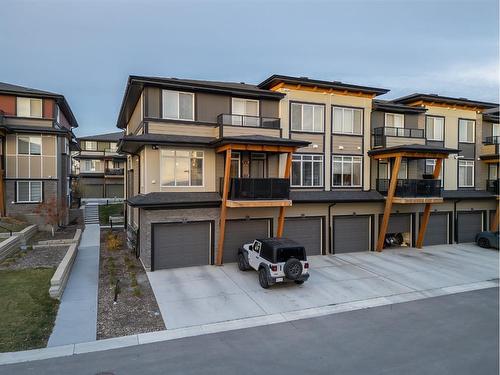 35-230 Seton Passage Se, Calgary, AB - Outdoor With Balcony With Facade