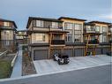 35-230 Seton Passage Se, Calgary, AB  - Outdoor With Balcony With Facade 