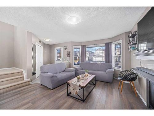 245 Evermeadow Avenue Sw, Calgary, AB - Indoor Photo Showing Living Room