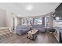 245 Evermeadow Avenue Sw, Calgary, AB  - Indoor Photo Showing Living Room 