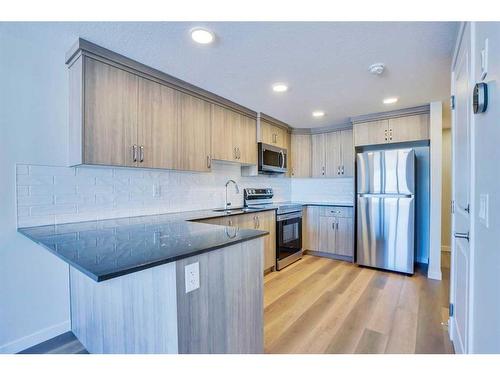 273 Lucas Place, Calgary, AB - Indoor Photo Showing Kitchen With Stainless Steel Kitchen