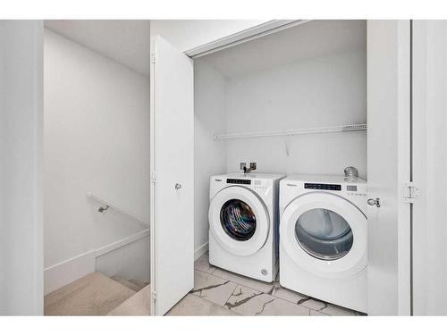 661 Savanna Boulevard Ne, Calgary, AB - Indoor Photo Showing Laundry Room