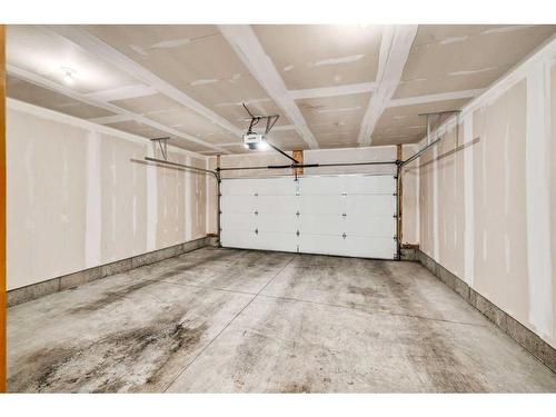 661 Savanna Boulevard Ne, Calgary, AB - Indoor Photo Showing Garage