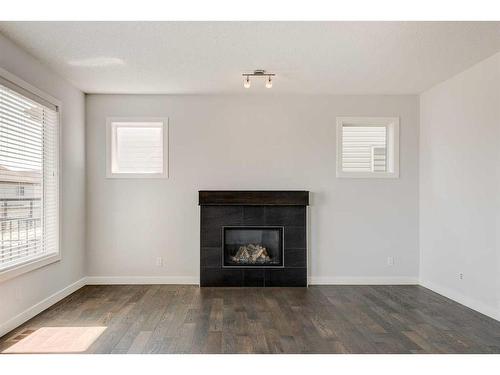 118 Panora Court Nw, Calgary, AB - Indoor Photo Showing Living Room With Fireplace