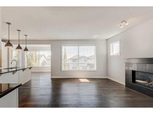 118 Panora Court Nw, Calgary, AB - Indoor Photo Showing Living Room With Fireplace