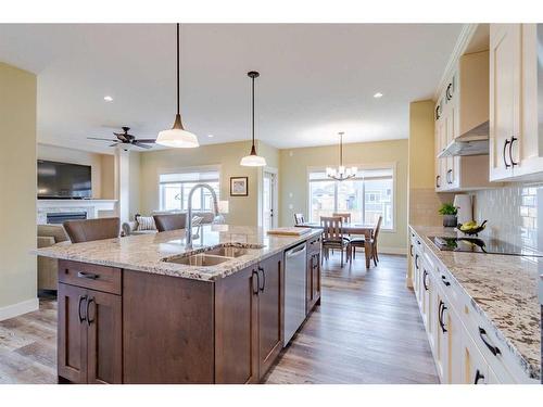 1352 Scarlett Ranch Boulevard, Carstairs, AB - Indoor Photo Showing Kitchen With Double Sink With Upgraded Kitchen