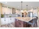 1352 Scarlett Ranch Boulevard, Carstairs, AB  - Indoor Photo Showing Kitchen With Upgraded Kitchen 