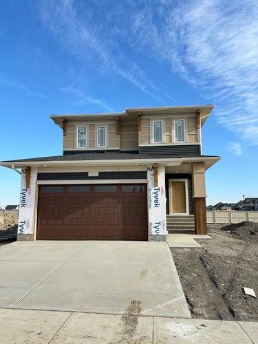 3680 Bayside Boulevard Sw, Airdrie, AB - Outdoor With Facade