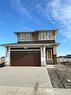 3680 Bayside Boulevard Sw, Airdrie, AB  - Outdoor With Facade 