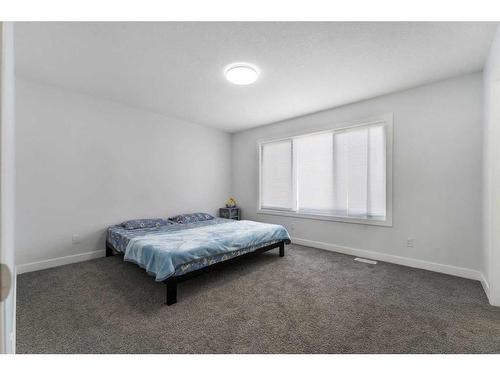 24 Cornerbrook Road Ne, Calgary, AB - Indoor Photo Showing Bedroom