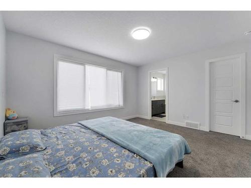 24 Cornerbrook Road Ne, Calgary, AB - Indoor Photo Showing Bedroom