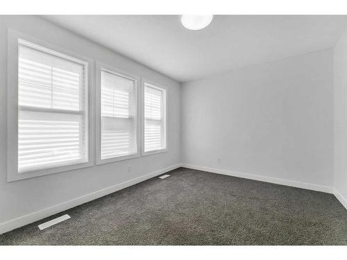 24 Cornerbrook Road Ne, Calgary, AB - Indoor Photo Showing Other Room