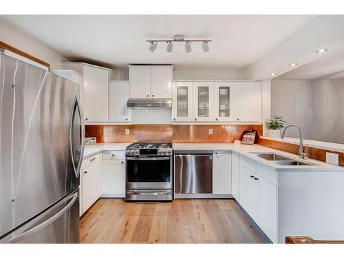 1514 22 Avenue Nw, Calgary, AB - Indoor Photo Showing Kitchen With Stainless Steel Kitchen With Double Sink