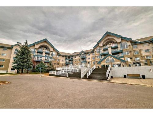 111-7239 Sierra Morena Boulevard Sw, Calgary, AB - Outdoor With Facade